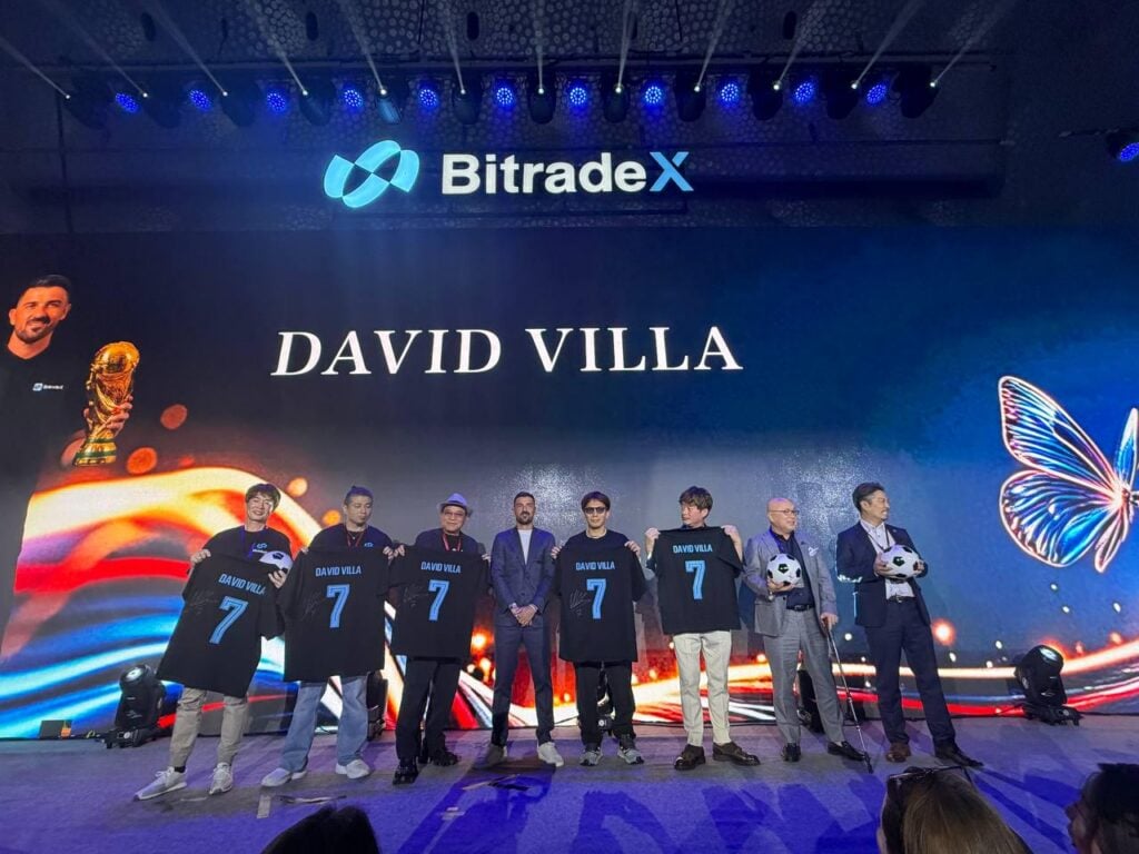Community members receive David Villa jerseys