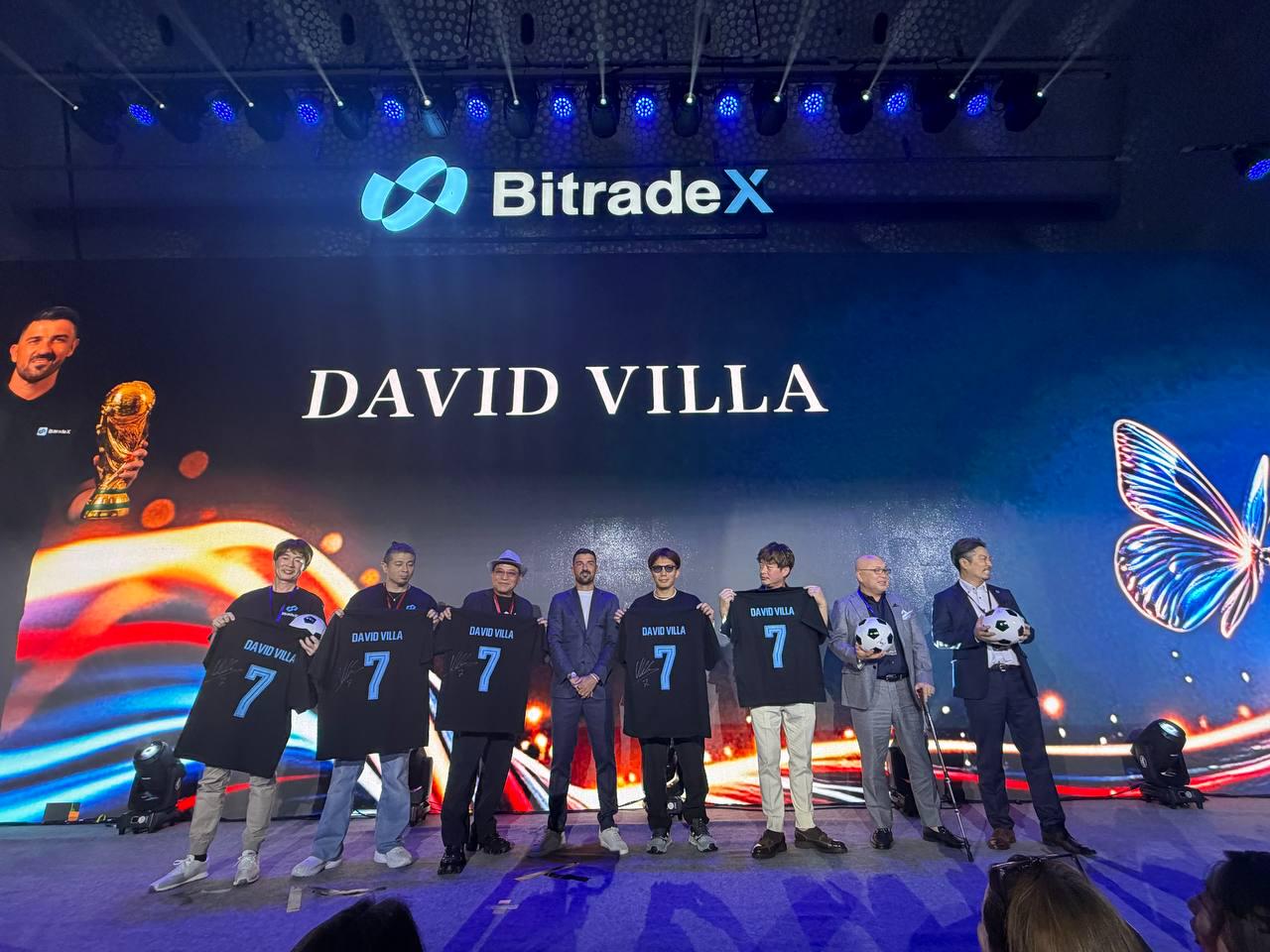 Community members receive David Villa jerseys